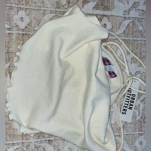 straps in the back are criss crossed from urban outfiters new never worn